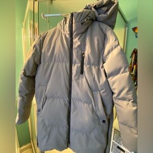 Puffy, hooded, rain resistant Orolay coat, grey with black zippers, pockets.